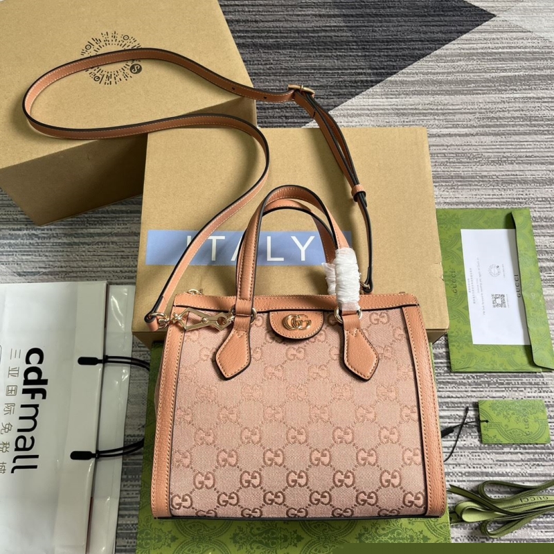 G*u*i top handle bags